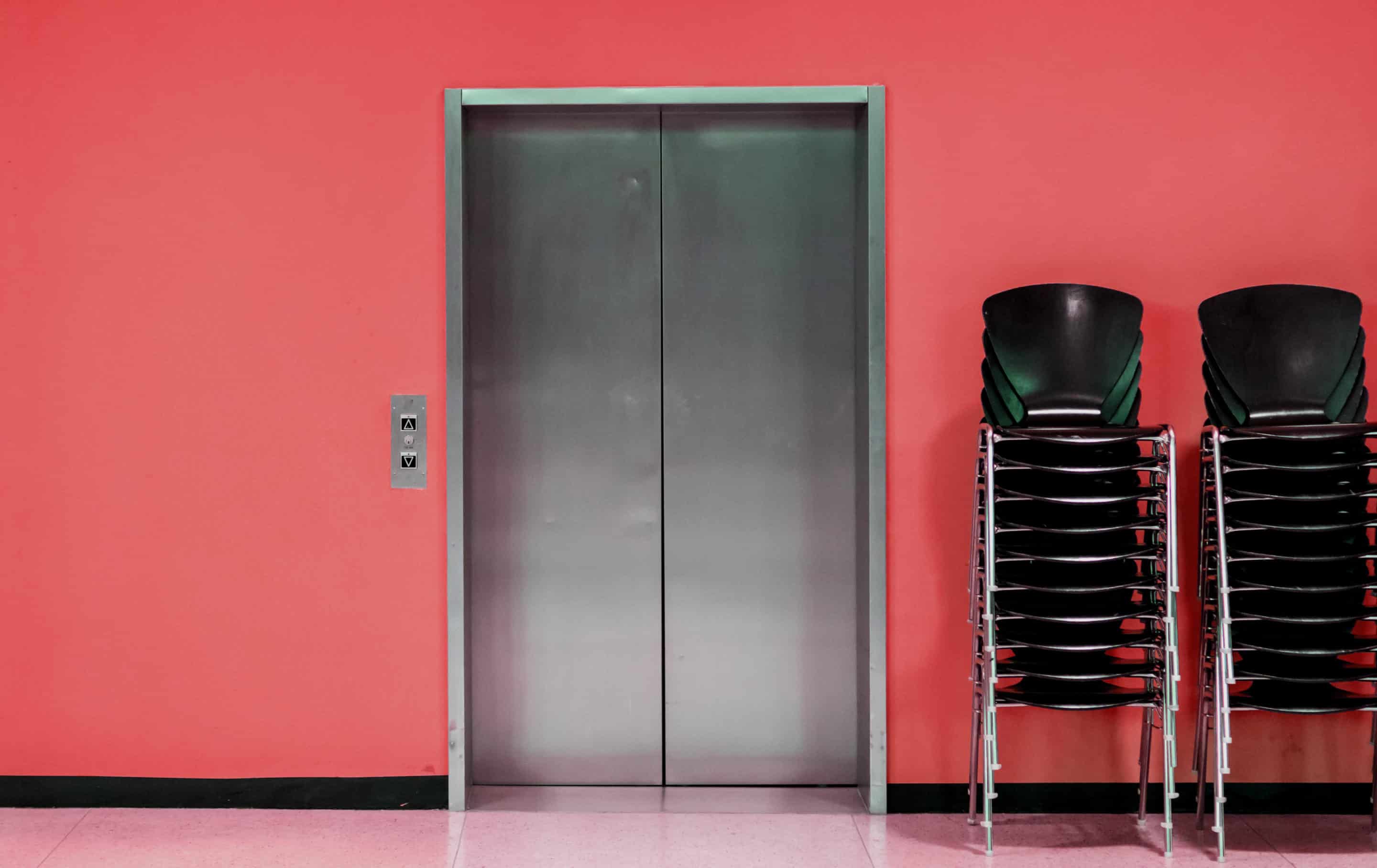 The front of an elevator for a business